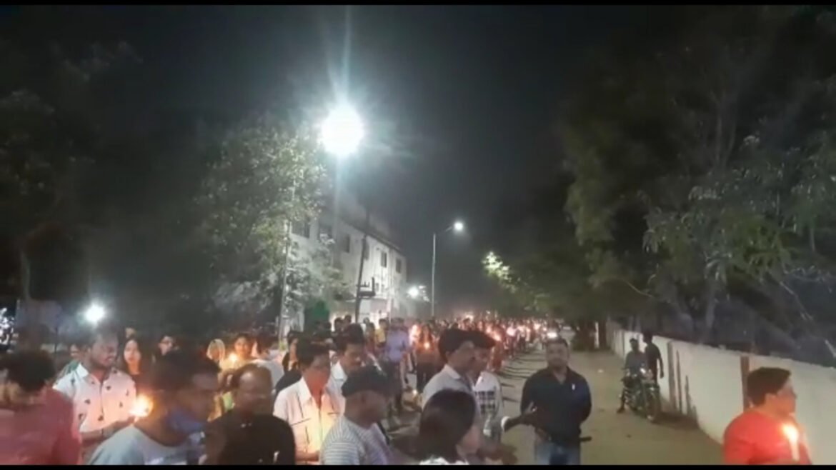 Candle march taken out by Christ Society on Easter Day, praying for world peace