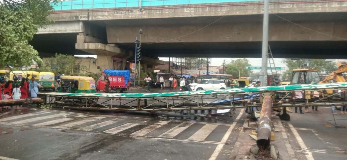Hoardings-walls fell due to strong storm-rain, one woman died